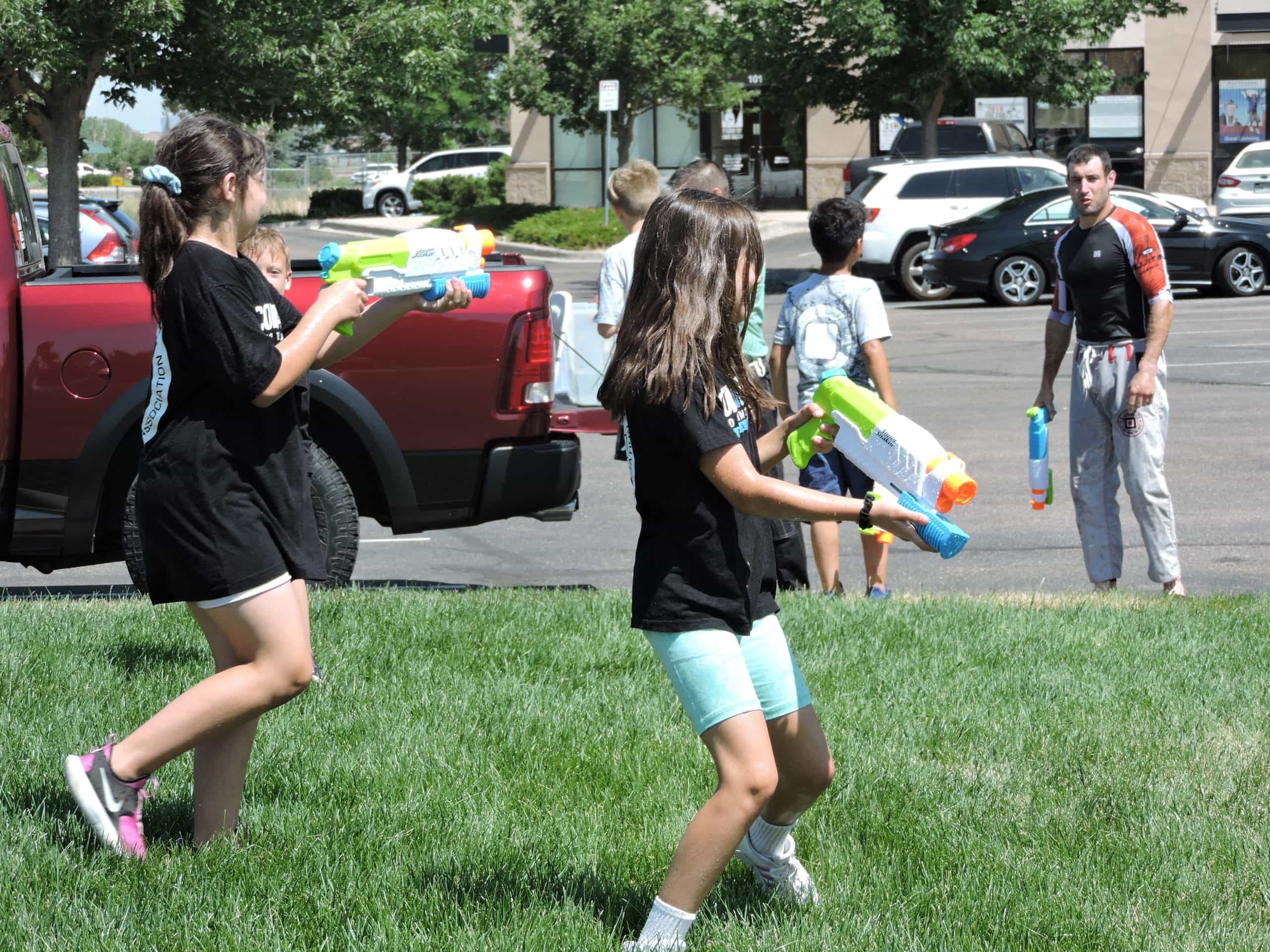 summer camp water gun fight