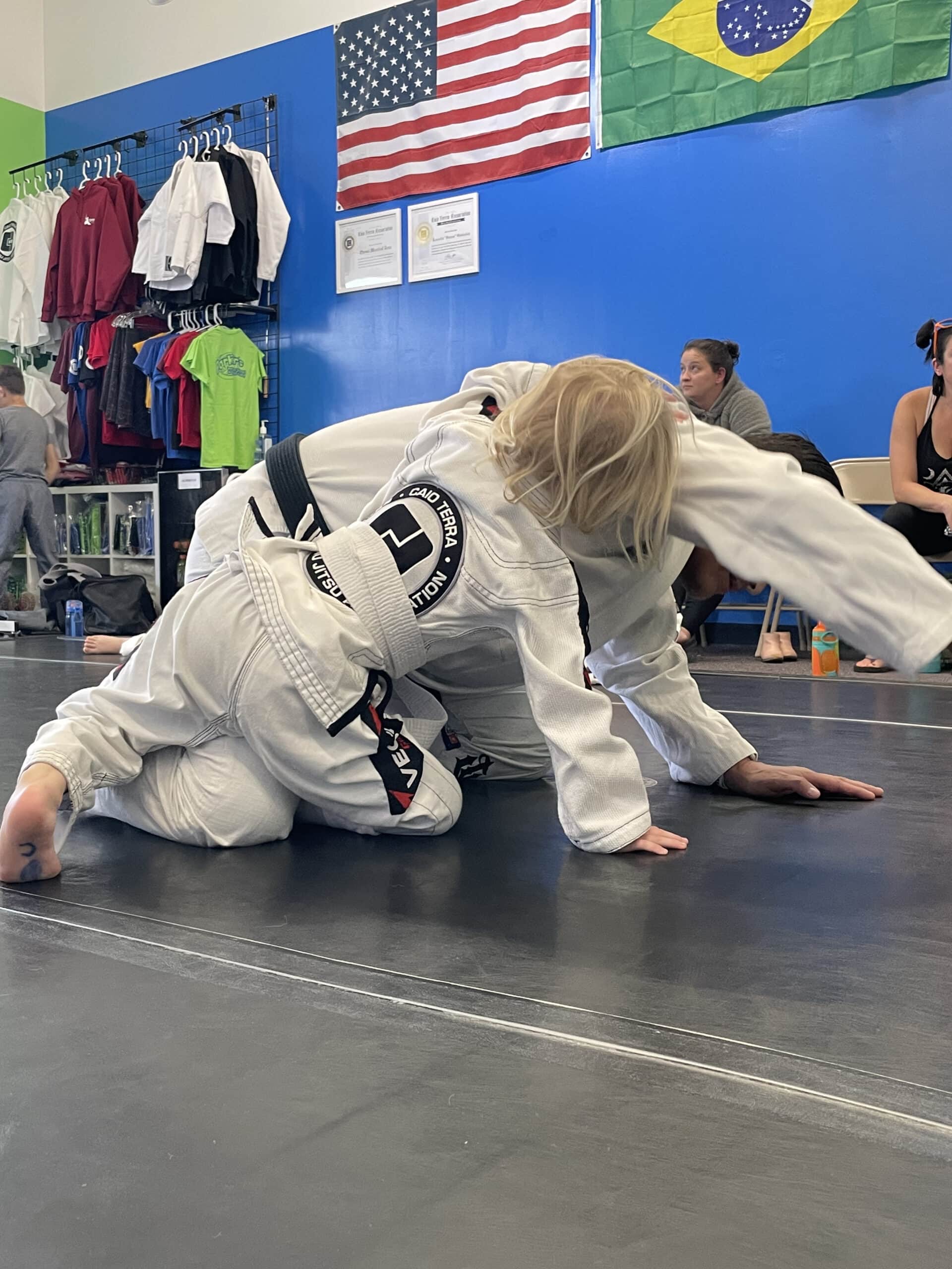 kids in jiu jitsu class with gi